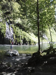 Ryan Greenblatt on a rock